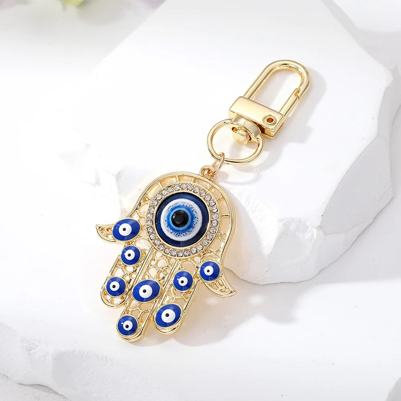 Bling Hollow Evil Eye Hamsa Hand Keychain Key Ring For Women Men Zircon Fatima Hand Blue Eye Bag Car Airpods Box Key Accessories