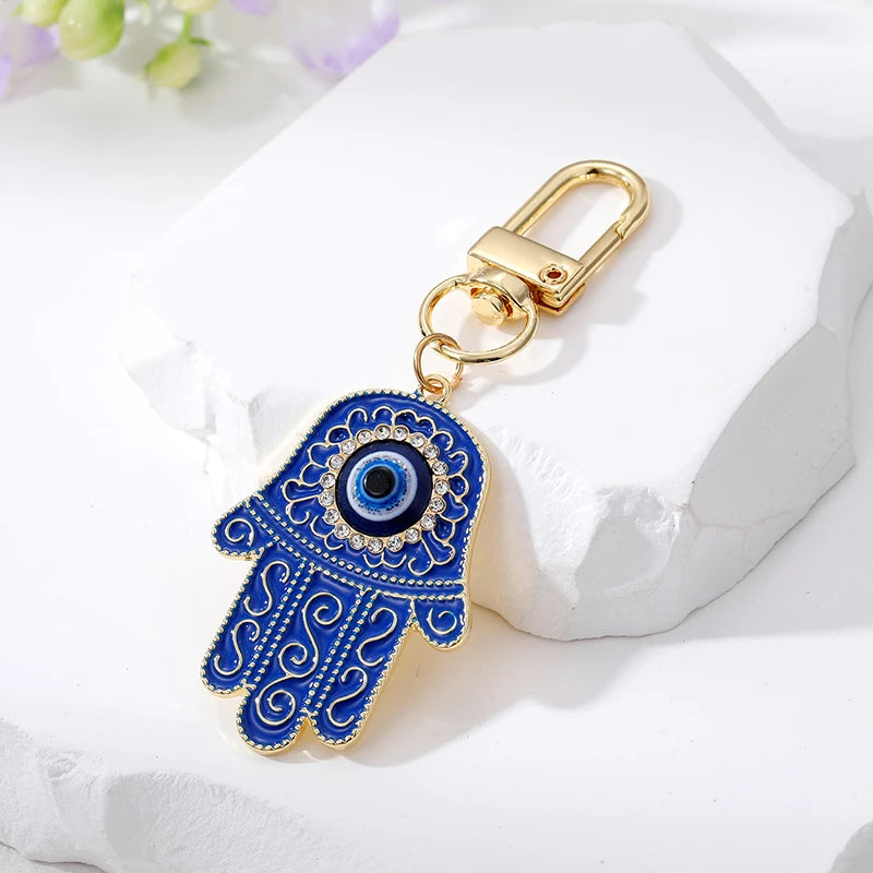 Bling Hollow Evil Eye Hamsa Hand Keychain Key Ring For Women Men Zircon Fatima Hand Blue Eye Bag Car Airpods Box Key Accessories