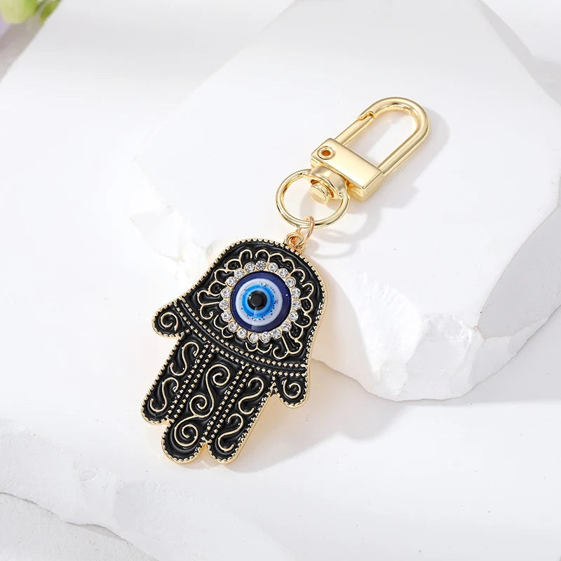 Bling Hollow Evil Eye Hamsa Hand Keychain Key Ring For Women Men Zircon Fatima Hand Blue Eye Bag Car Airpods Box Key Accessories