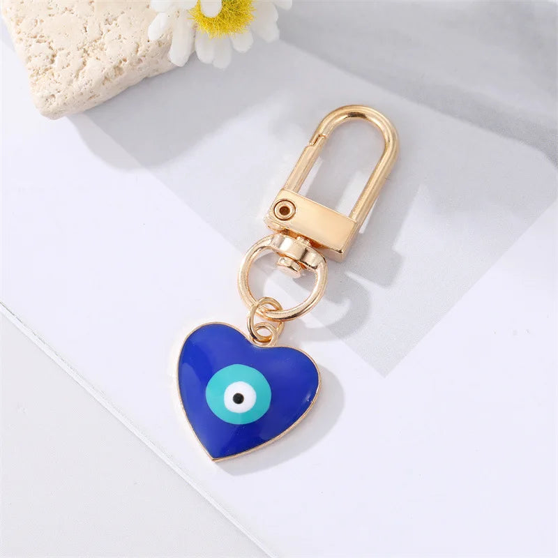 Bling Hollow Evil Eye Hamsa Hand Keychain Key Ring For Women Men Zircon Fatima Hand Blue Eye Bag Car Airpods Box Key Accessories