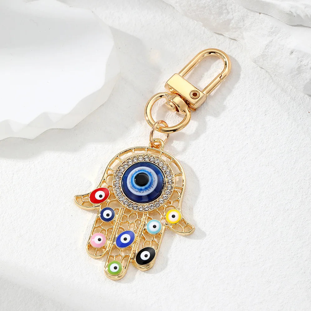 Bling Hollow Evil Eye Hamsa Hand Keychain Key Ring For Women Men Zircon Fatima Hand Blue Eye Bag Car Airpods Box Key Accessories