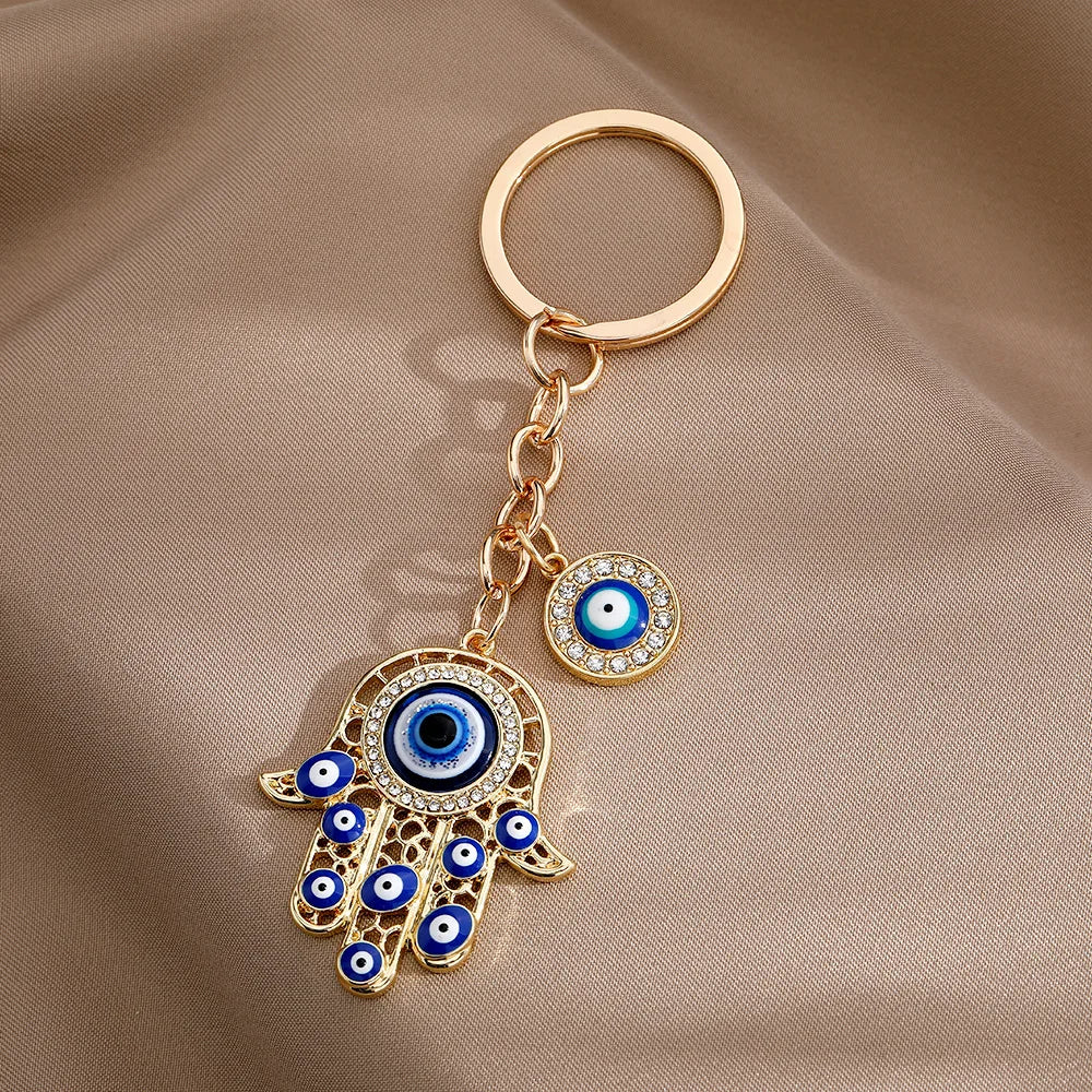 Bling Hollow Evil Eye Hamsa Hand Keychain Key Ring For Women Men Zircon Fatima Hand Blue Eye Bag Car Airpods Box Key Accessories